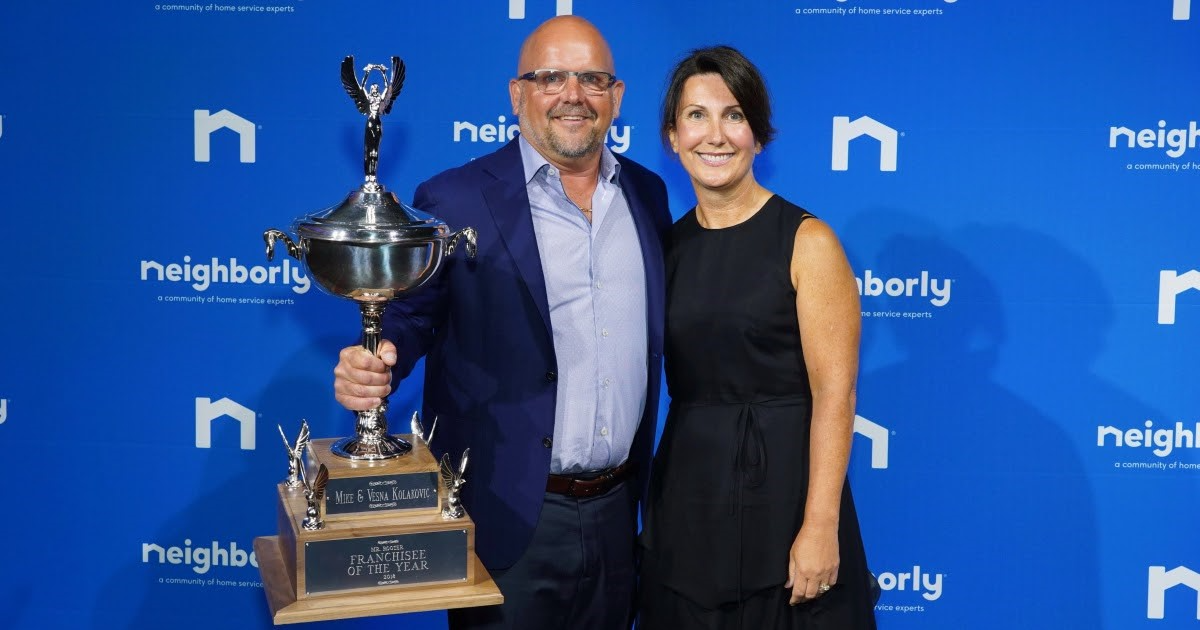Mike and Vesna, owners of Mr. Rooter accepting the 2019 franchisee of the year award.