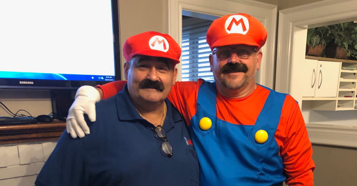 Mr. Rooter Plumbing of Mississauga plumbers dressed up as Mario.