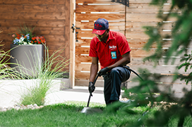 Mr. Rooter professional fixing a sewer line.