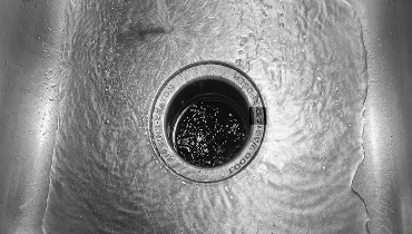 Water draining in a sink