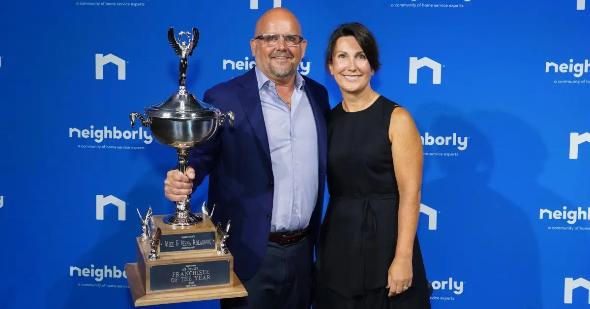 Mike and Vesna, owners of Mr. Rooter Plumbing of Mississsauga, accepting the 2019 franchisee of the year award.