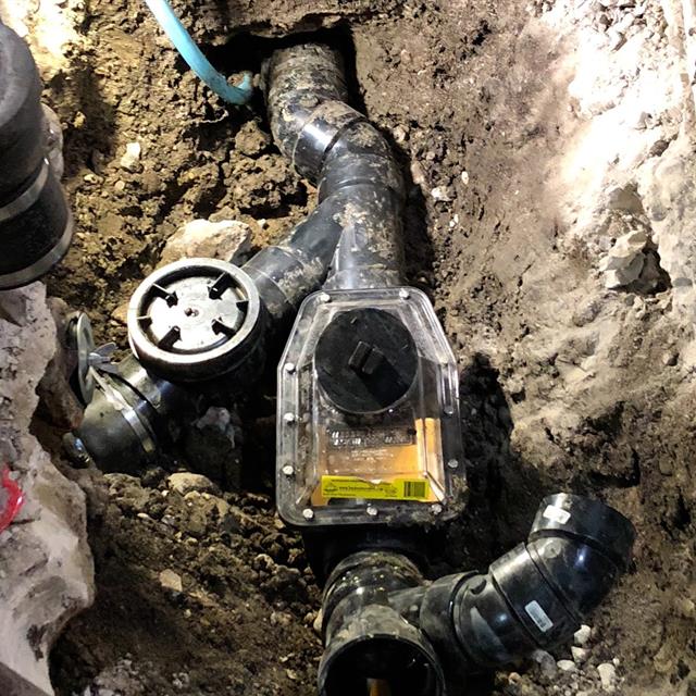 Backwater valve installation at a customer’s home in Edmonton